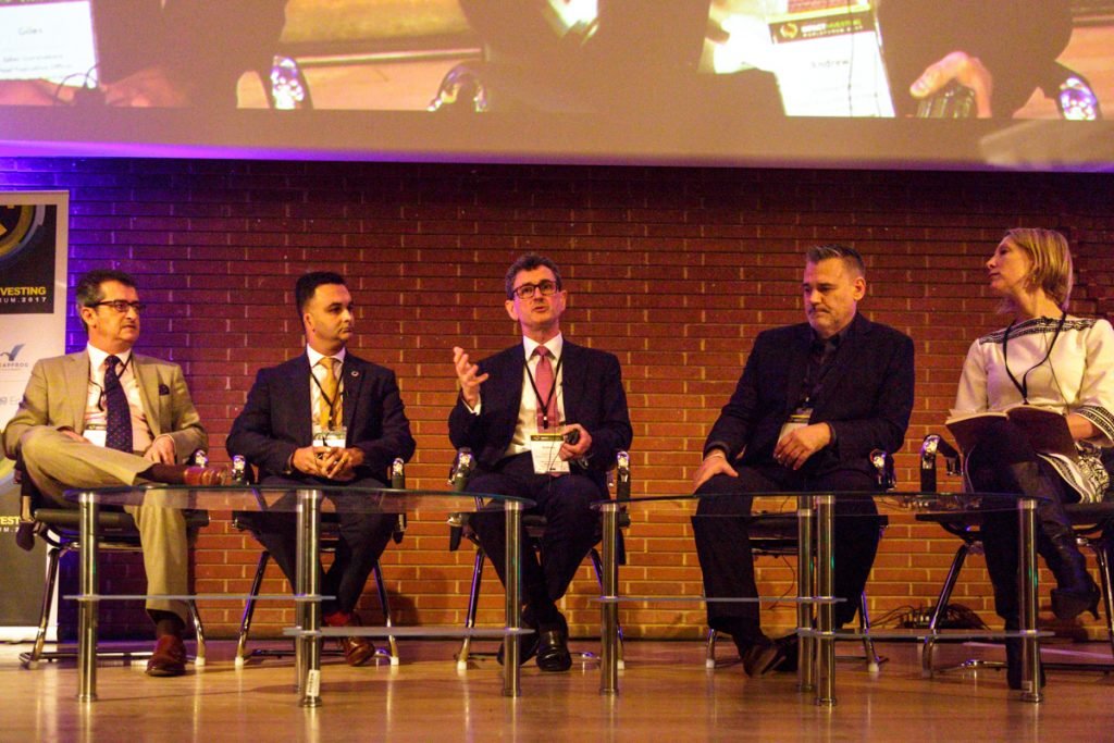 Mining conference panel on The Great Hall stage